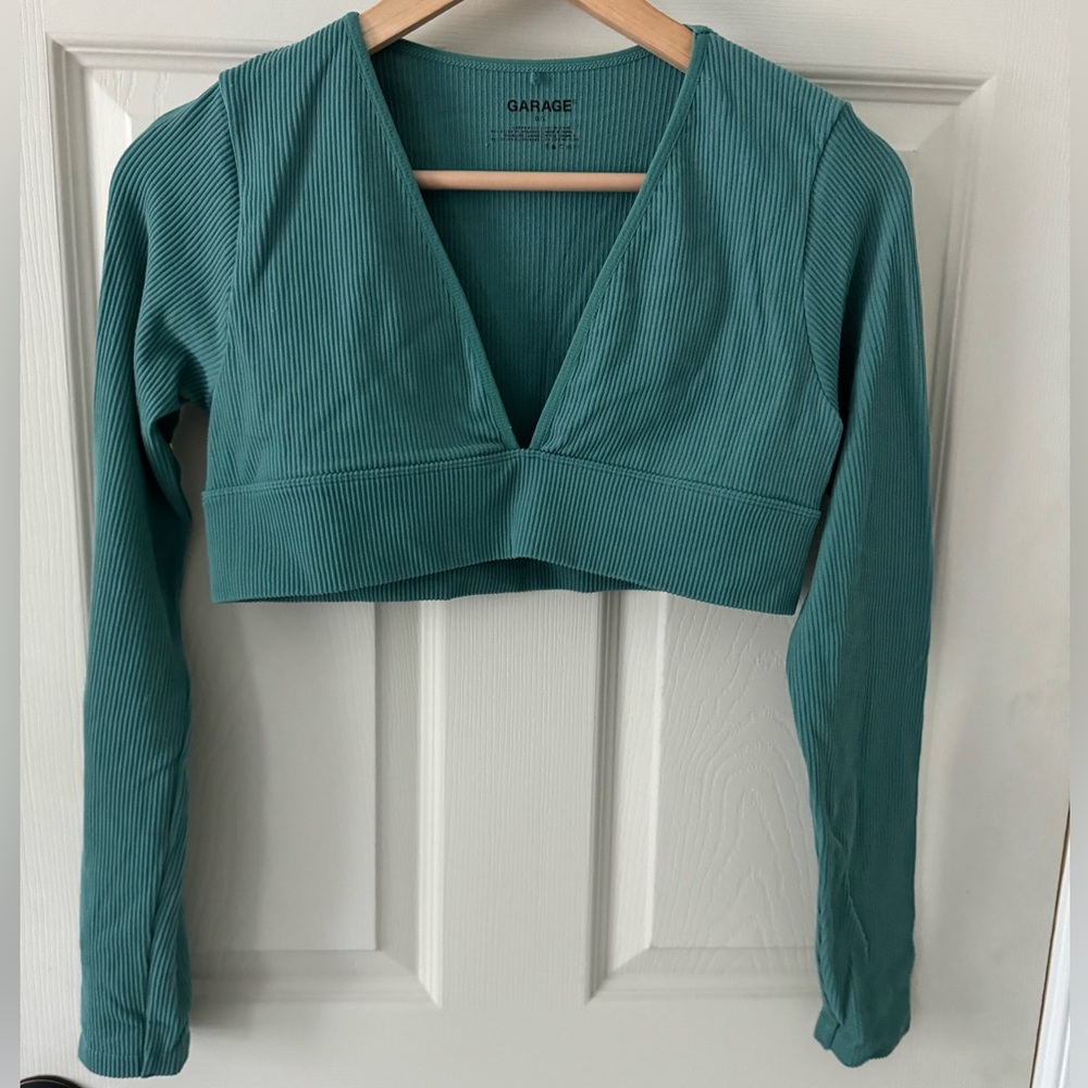 Garage clothing store turquoise cropped long sleeve v shaped ribbed top